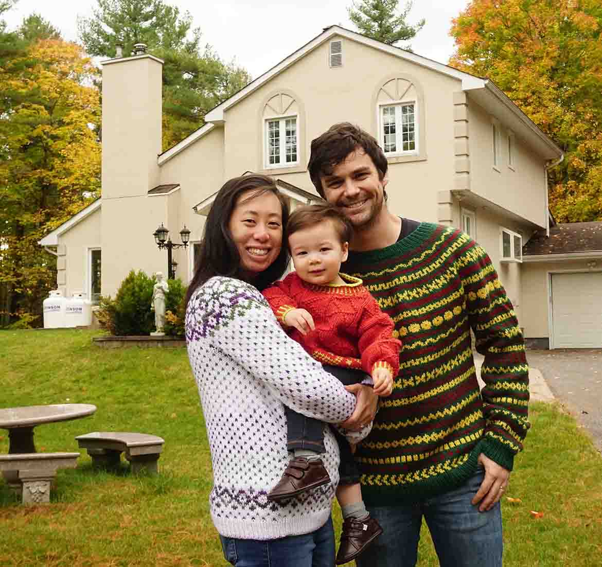 vanessa lee, husband and baby stand outside their home