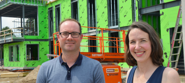 MJW-CYDC Director Dr. Colin King and Assistant Director Dr. Katelyn Bryant stand in front of the soon-to-be new home for this important community clinic.