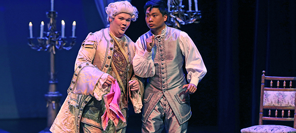 Two opera students performing in Baroque period costume