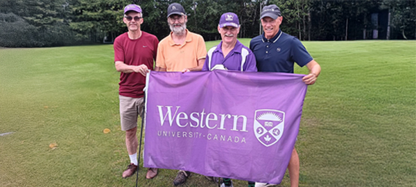John Winchester and group holding a Western flag