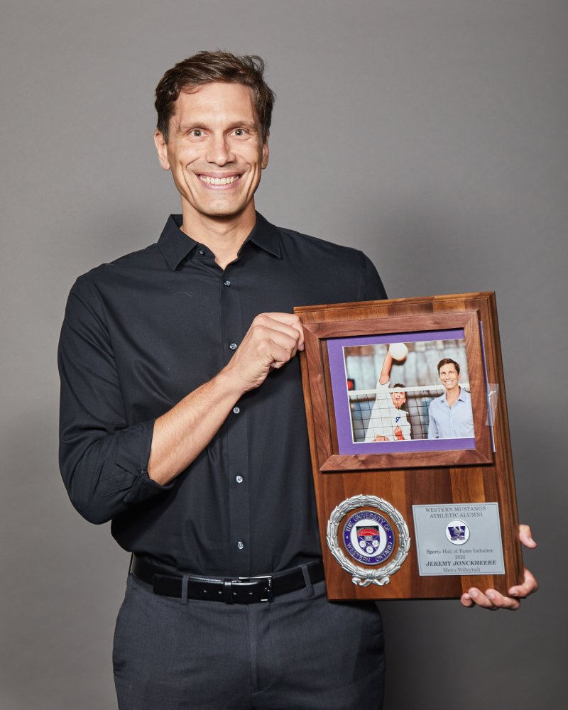 Jeremy Jonckheere holding his WMAA Hall of Fame Inductee plaque