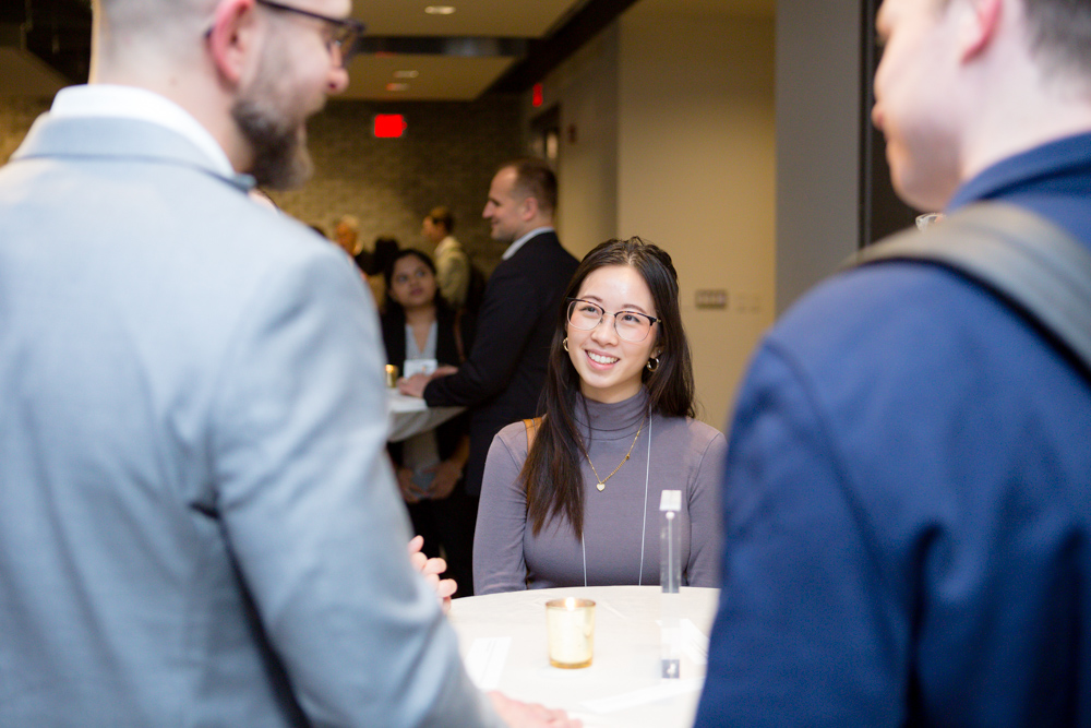 A Guest Standing And Listening To A Guest
